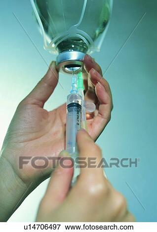 Medical Procedure, Science And Technology, Iv Drip, Filling, Needle, Indoor View Large Photo Image Stock Photo - Medical Procedure, Science And Technology, Iv Drip, Filling, Needle, Indoor. Fotosearch