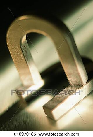 Stock Photography - Metallic, Light, Indoor, Magnet, Close-Up, Attached. Fotosearch
