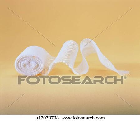 Stock Photo - Bandage, Close-Up, Colored Background. Fotosearch