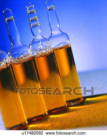 Stock Image - Close-Up, Colored Background, Four Objects, Glass, Indoor. Fotosearch