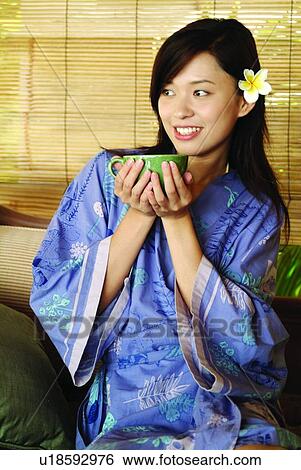 Stock Photograph - Blinds, Cheerful, Brown Hair, Bowl, Asian Ethnicity. Fotosearch
