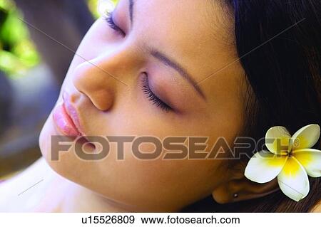 Stock Photo - Focus On Foreground, Lying On Back, Serene People, Body Care. Fotosearch