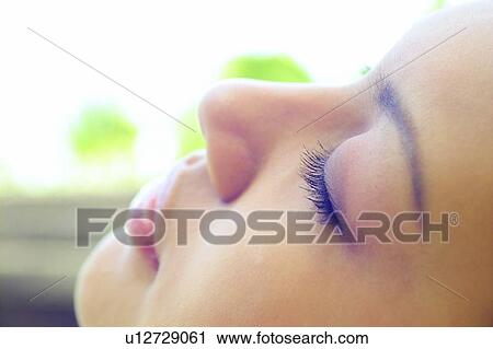 Stock Image - Human Face, Outdoor, Salon, Getting Away From It All, Close-Up. Fotosearch