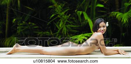 Picture - Looking At Camera, Smiling, Relaxation, Sensuality, Lying Down, Desire, Wearing Flowers. Fotosearch