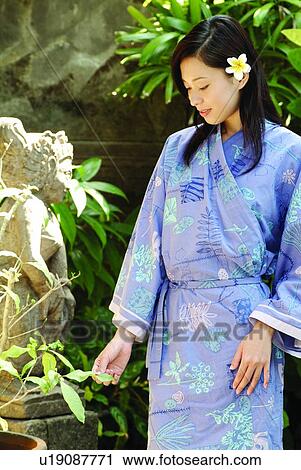 Outdoor, Front Or Back Yard, Japanese Ethnicity, Sunlight, Traditional Clothing, Leaf, Lifestyles View Large Photo Image Stock Image - Outdoor, Front Or Back Yard, Japanese Ethnicity, Sunlight, Traditional Clothing, Leaf, Lifestyles. Fotosearch