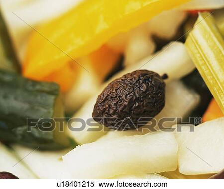 Stock Photography -  an Olive Berry Among Several Other Vegetables, High Angle View, Differential Focus. Fotosearch