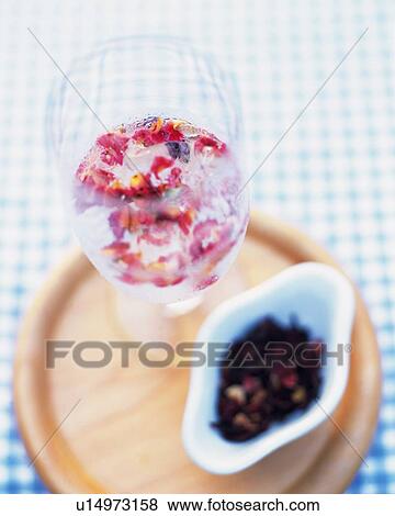 Rose Hip in a Glass, Standing on a Wooden Tray, High Angle View, Differential Focus View Large Photo Image Stock Photo - Rose Hip in a Glass, Standing on a Wooden Tray, High Angle View, Differential Focus. Fotosearch