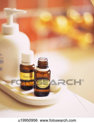 Two Little Bins of Aromatherapy, Next to a Soap Bottle, Front View, Differential Focus View Large Photo Image Stock Photograph - Two Little Bins of Aromatherapy, Next to a Soap Bottle, Front View, Differential Focus. Fotosearch