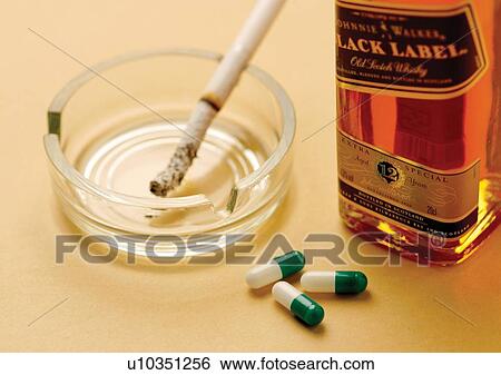 Stock Photograph - antidote, bottle, ash tray, alcohol. Fotosearch