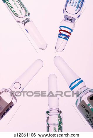 Stock Photograph - blur, bottles, device, dose. Fotosearch