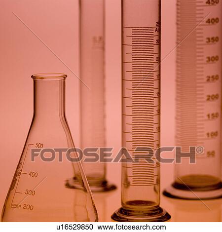 Stock Image - Close-up of a flask and glass tubes. Fotosearch
