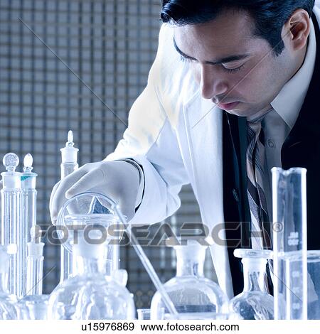Close-up of a scientist working in a laboratory View Large Photo Image Stock Photo - Close-up of a scientist working in a laboratory. Fotosearch