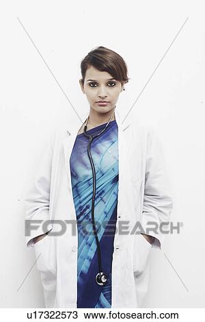Stock Image - Portrait of a female doctor with a stethoscope around her neck. Fotosearch