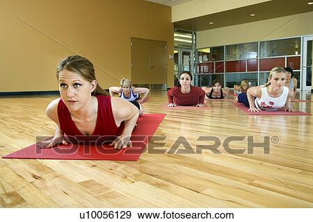 Prime adult female Caucasians in yoga class. View Large Photo Image Stock Photo - Prime adult female Caucasians in yoga class.. Fotosearch