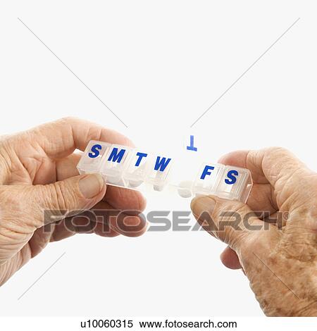 Caucasion elderly male hands holding seven-day pill box with Thursday open. View Large Photo Image Stock Photography - Caucasion elderly male hands holding seven-day pill box with Thursday open. . Fotosearch