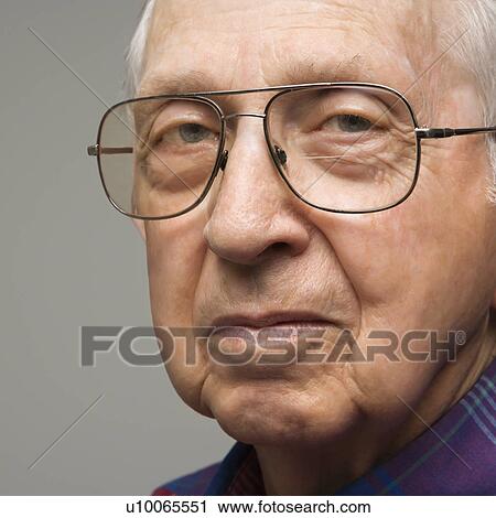 Close-up portrait of elderly man in glasses. View Large Photo Image Stock Image - Close-up portrait of elderly man in glasses.. Fotosearch