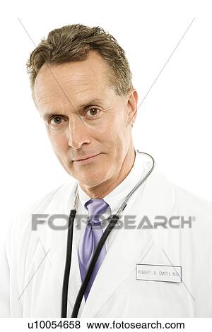 Portrait of a mid-adult Caucasian male doctor with stethoscope around his neck. View Large Photo Image Stock Photo - Portrait of a mid-adult Caucasian male doctor with stethoscope around his neck.. Fotosearch