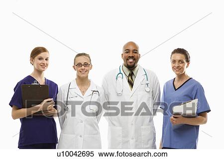 Stock Image - Portrait of African-American man and Caucasian women medical healthcare workers smiling in uniforms standing against white background.. Fotosearch - Search Stock Photos, Mural Pictures, Photographs, and Photo Clipart
