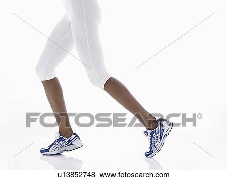 Female athlete's legs (low section) View Large Photo Image Stock Photo - Female athlete's legs (low section). Fotosearch