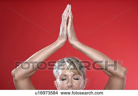 Mature woman in tree pose View Large Photo Image Picture - Mature woman in tree pose. Fotosearch