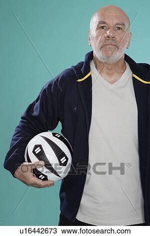 Senior man with soccer ball View Large Photo Image Stock Image - Senior man with soccer ball. Fotosearch