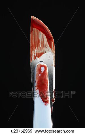 Stock Photo - Blood on scalpel (close-up). Fotosearch
