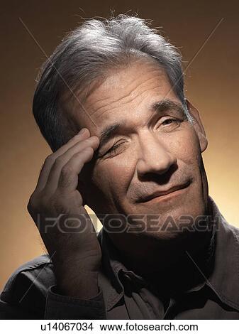 Mature man with headache View Large Photo Image Picture - Mature man with headache. Fotosearch