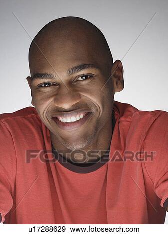 Young man smiling (portrait) View Large Photo Image Stock Photo - Young man smiling (portrait). Fotosearch