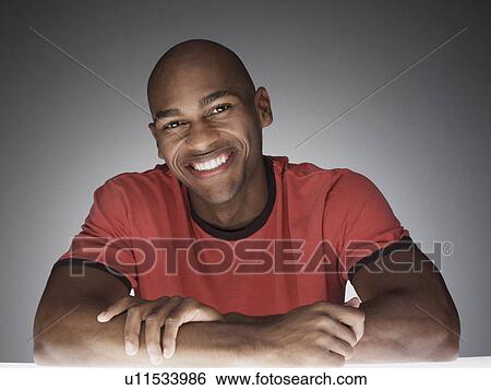 Young man smiling (portrait) View Large Photo Image Stock Photograph - Young man smiling (portrait). Fotosearch