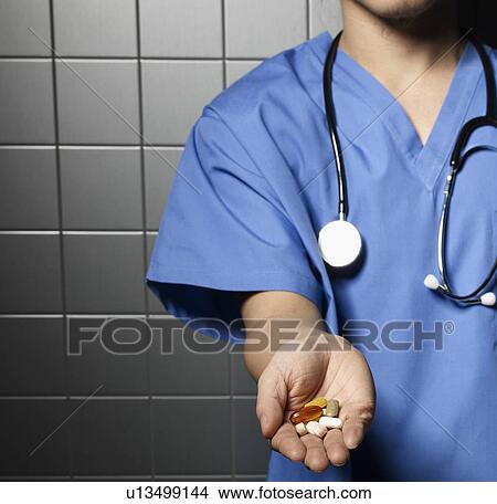 Doctor Holding Pills in Hand View Large Photo Image Picture - Doctor Holding Pills in Hand. Fotosearch