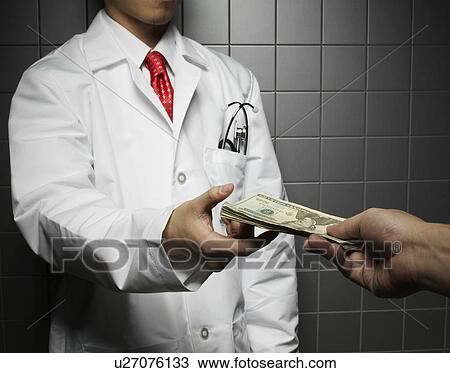 Stock Image - Doctor Receiving US Dollars. Fotosearch