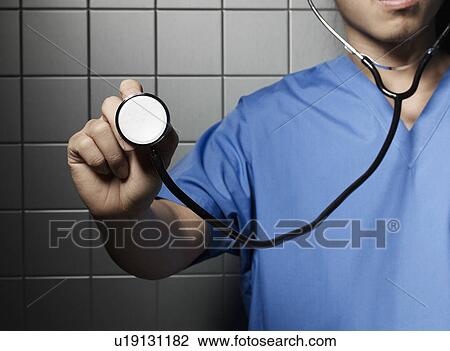 Stock Image - Doctor with Stethoscope. Fotosearch