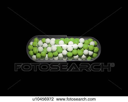 Stock Image - Green and White Pills. Fotosearch