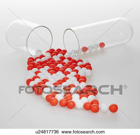 Stock Photograph - Red and White Pills Spilling Out From Capsule. Fotosearch