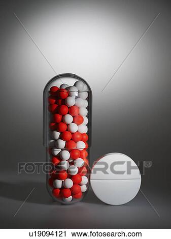 Tablet beside Red and White Capsules View Large Photo Image Stock Image - Tablet beside Red and White Capsules. Fotosearch