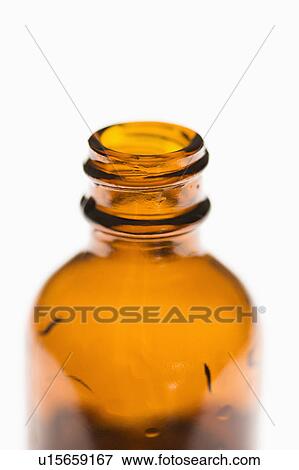Stock Photo - Brown bottle on white background.. Fotosearch
