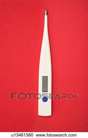 Digital thermometer on red background. View Large Photo Image Stock Image - Digital thermometer on red background.. Fotosearch