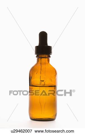 Dropper with white background. View Large Photo Image Stock Photo - Dropper with white background.. Fotosearch