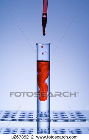 Eye dropper dropping red liquid into glass tube. View Large Photo Image Stock Image - Eye dropper dropping red liquid into glass tube.. Fotosearch