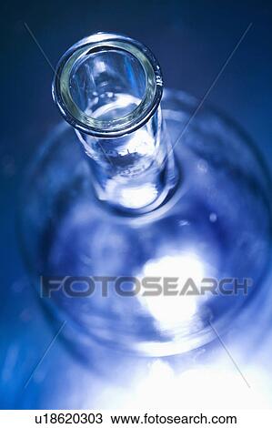 Stock Image - Glass science container with blue tint.. Fotosearch