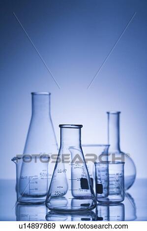 Glass science containers with blue tint. View Large Photo Image Stock Photo - Glass science containers with blue tint.. Fotosearch