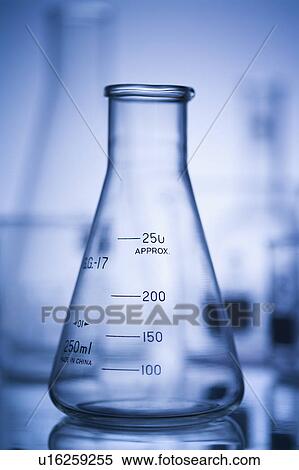 Stock Photography - Glass science containers with blue tint.. Fotosearch