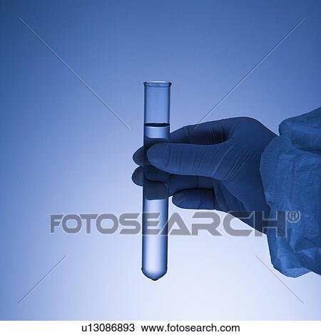 Hand holding test tube. View Large Photo Image Stock Image - Hand holding test tube.. Fotosearch