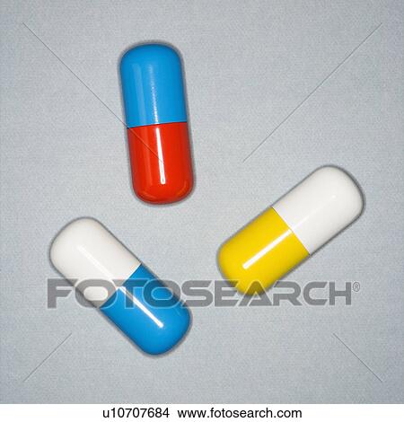 Picture - Medical pills on a gray background.. Fotosearch