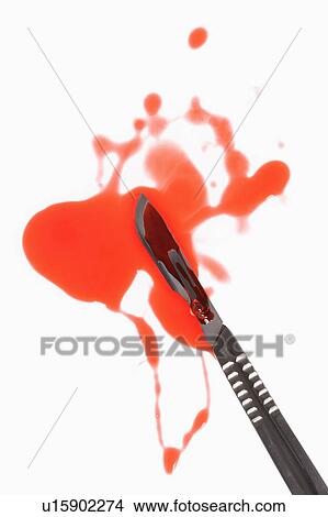 Picture - Medical scapel with fake blood around it.. Fotosearch