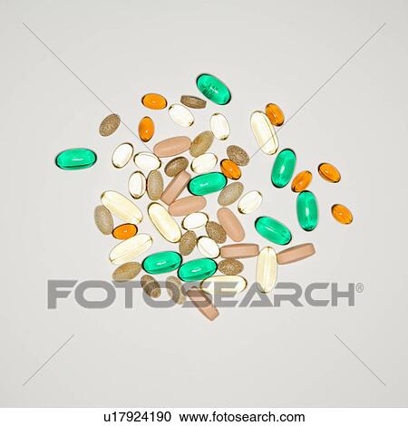 Stock Image - Pills and vitamins.. Fotosearch