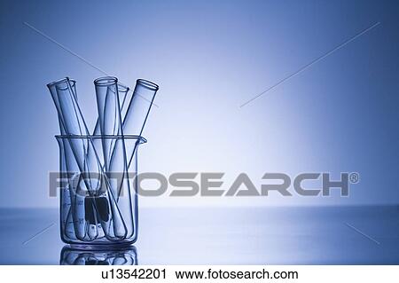 Test tubes in glass beaker with blue tint. View Large Photo Image Stock Image - Test tubes in glass beaker with blue tint.. Fotosearch