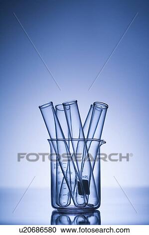 Test tubes in glass beaker with blue tint. View Large Photo Image Stock Image - Test tubes in glass beaker with blue tint.. Fotosearch