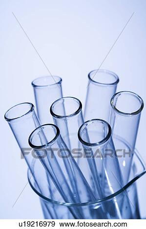 Stock Photo - Test tubes in glass beaker with blue tint.. Fotosearch