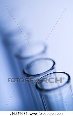 Stock Image - Test tubes with blue tint.. Fotosearch